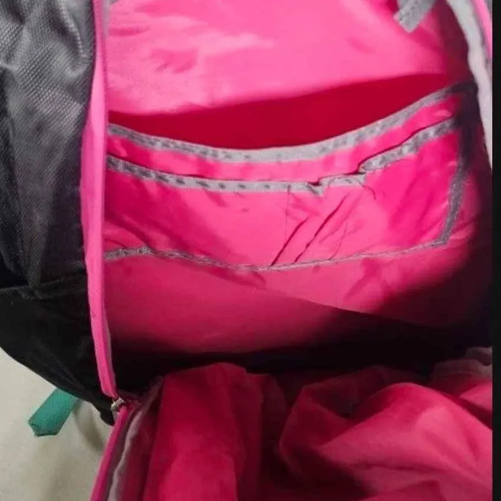 AVIA Black, Blue and Pink Backpack with Multi pockets. New without Tags